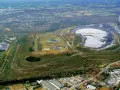 Brinkfortsheide Marl: Eine weite Landschaft mit Industrieanlagen, Wohngebieten und einer großen Abraumhalde.