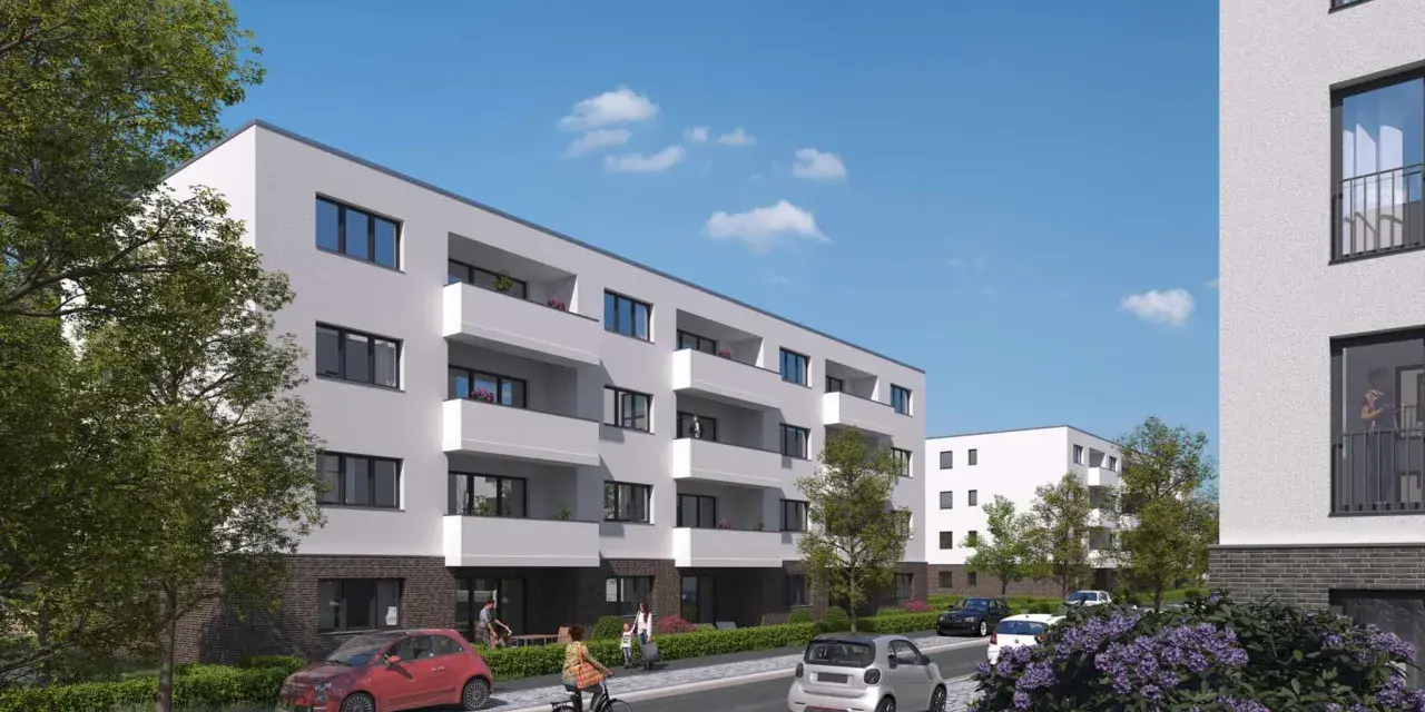 Moderne Wohnanlage im Kronprinzenviertel Dortmund mit Balkonen, Autos und grünen Bäumen.