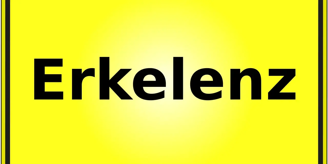 Gelbes Ortsschild mit schwarzer Schrift "Erkelenz". Hier finden Sie Informationen zum Mietspiegel Erkelenz.