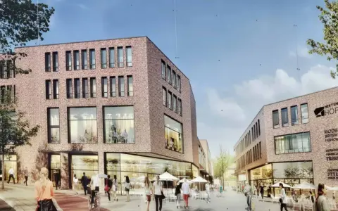 Belebtes Treiben in der Herten Innenstadt: Menschen flanieren vor modernen Backsteingebäuden mit großen Fensterfronten und Cafés.
