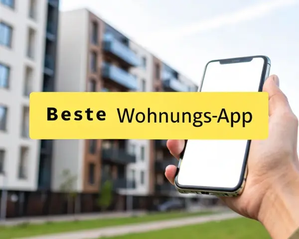 Hand hält Smartphone mit der Aufschrift "Beste Wohnungs-App" vor modernen Gebäuden.