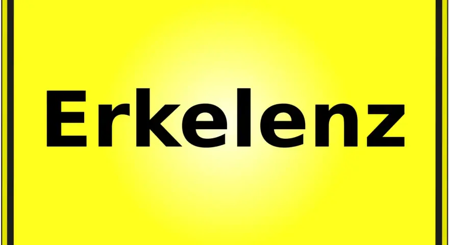 Gelbes Ortsschild mit schwarzer Schrift "Erkelenz". Hier finden Sie Informationen zum Mietspiegel Erkelenz.