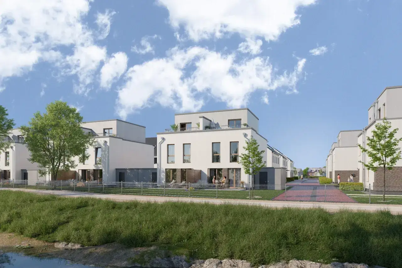 Moderne Reihenh&auml;user mit begr&uuml;nten Terrassen und Vorg&auml;rten. Hier wird in Recklinghausen gebaut, eine neue Wohnsiedlung am Wasser.