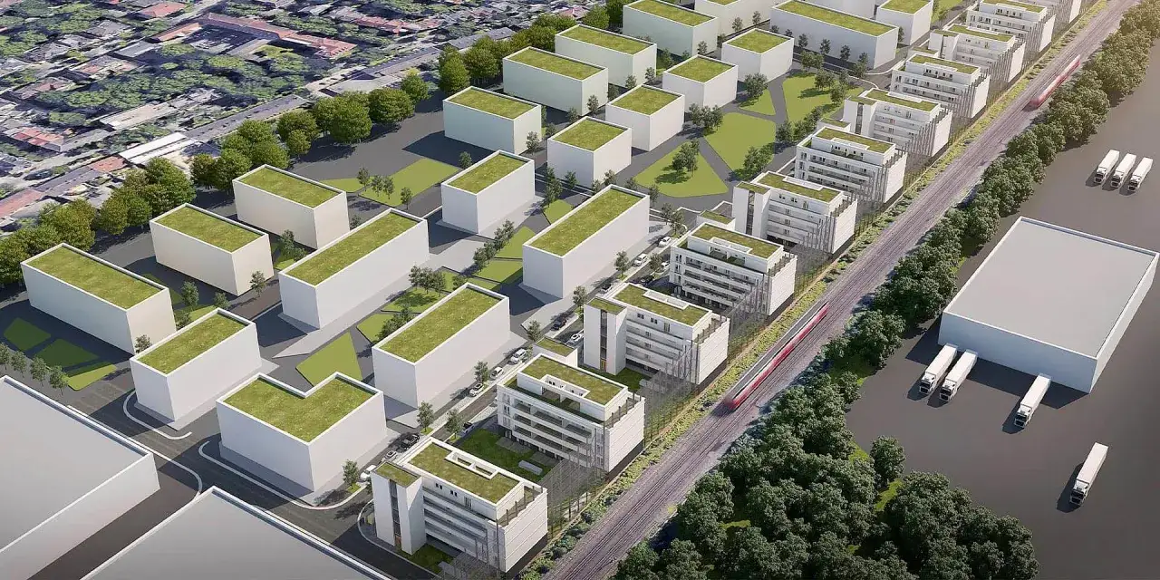 Moderne Wohngeb&auml;ude mit Gr&uuml;nd&auml;chern und ein Zug im Kronprinzenviertel Dortmund.